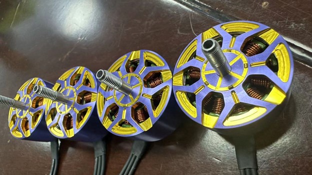 Four X team Drone motors on the table