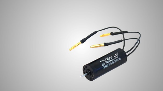 Precision X team Sensored Motor Placed in grey background