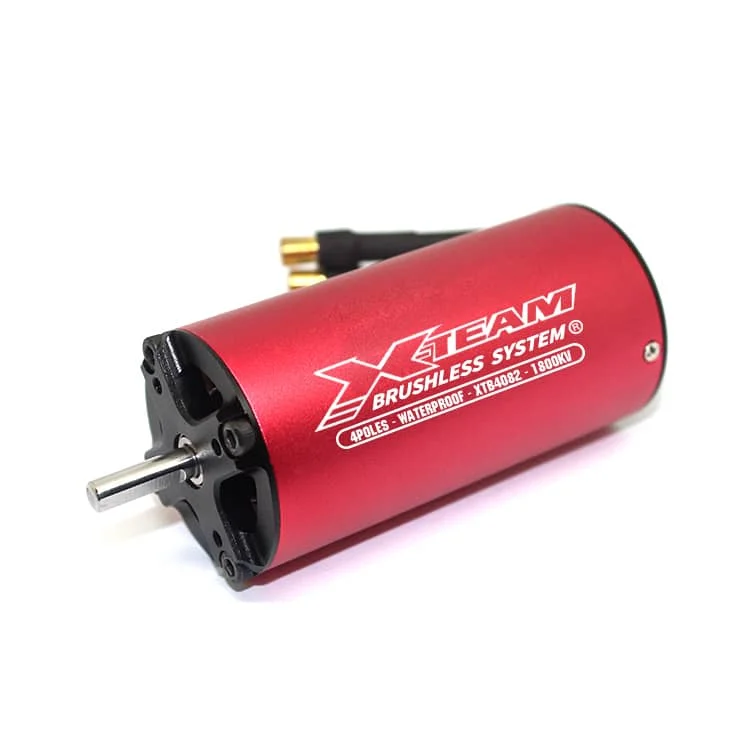 Red RC brushless motor with exposed shaft and gold connectors, labeled XTEAM Brushless System (waterproof, 1800KV)